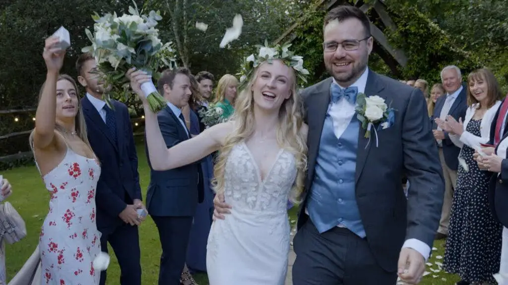 Another bride and groom looking very happy indeed