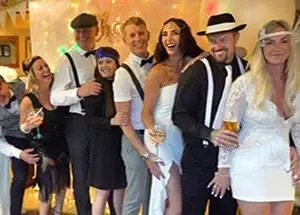 People in a conga line party