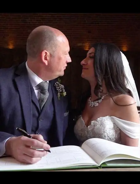 Married couple looking at each other